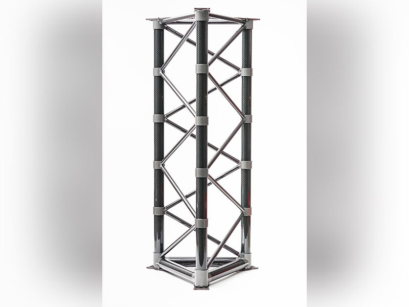 A completed truss structure / marine sensor mast is placed standing in a vertical position. The backgound is white. 